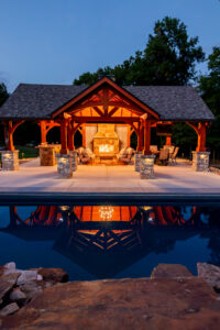 Backyard project timeline showing patio and fire feature for fall