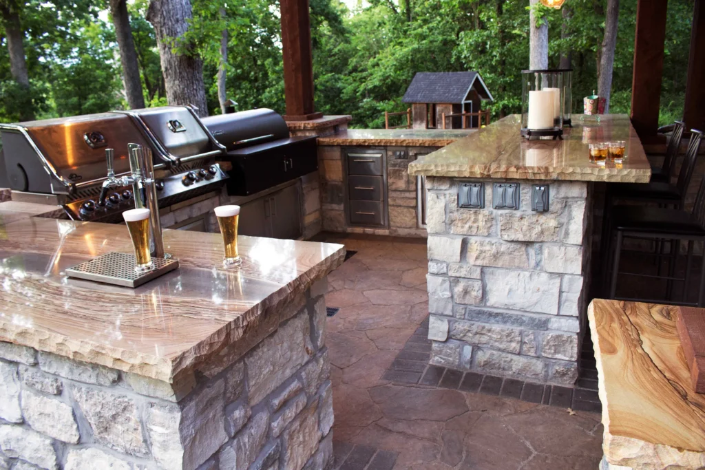 Full Masonry outdoor kitchen with grill, smoker, fridge, and paver patio in Sunset Hills, Missouri.