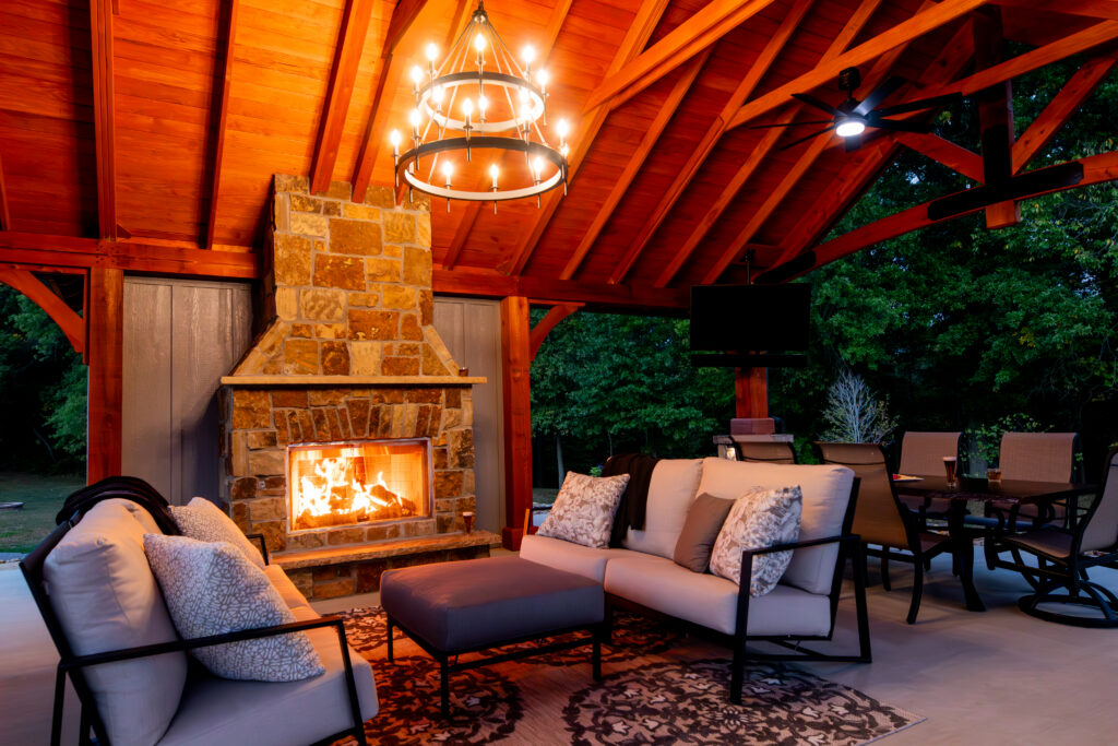 Outdoor full masonry fireplace under timber frame pavilion in Edwardsville IL